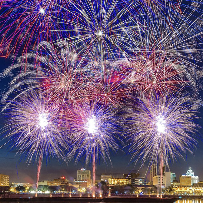 Fourth of July fireworks celebration over the Illinois River in downtown Peoria, IL